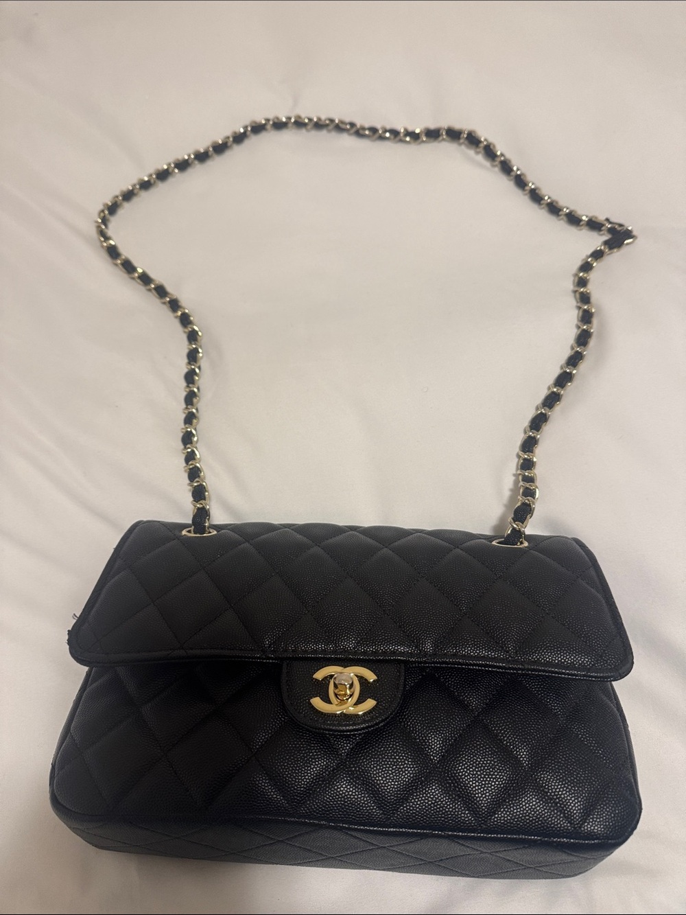 CHANEL Black Quilted Leather Shoulder Bag with Gold Chain Strap